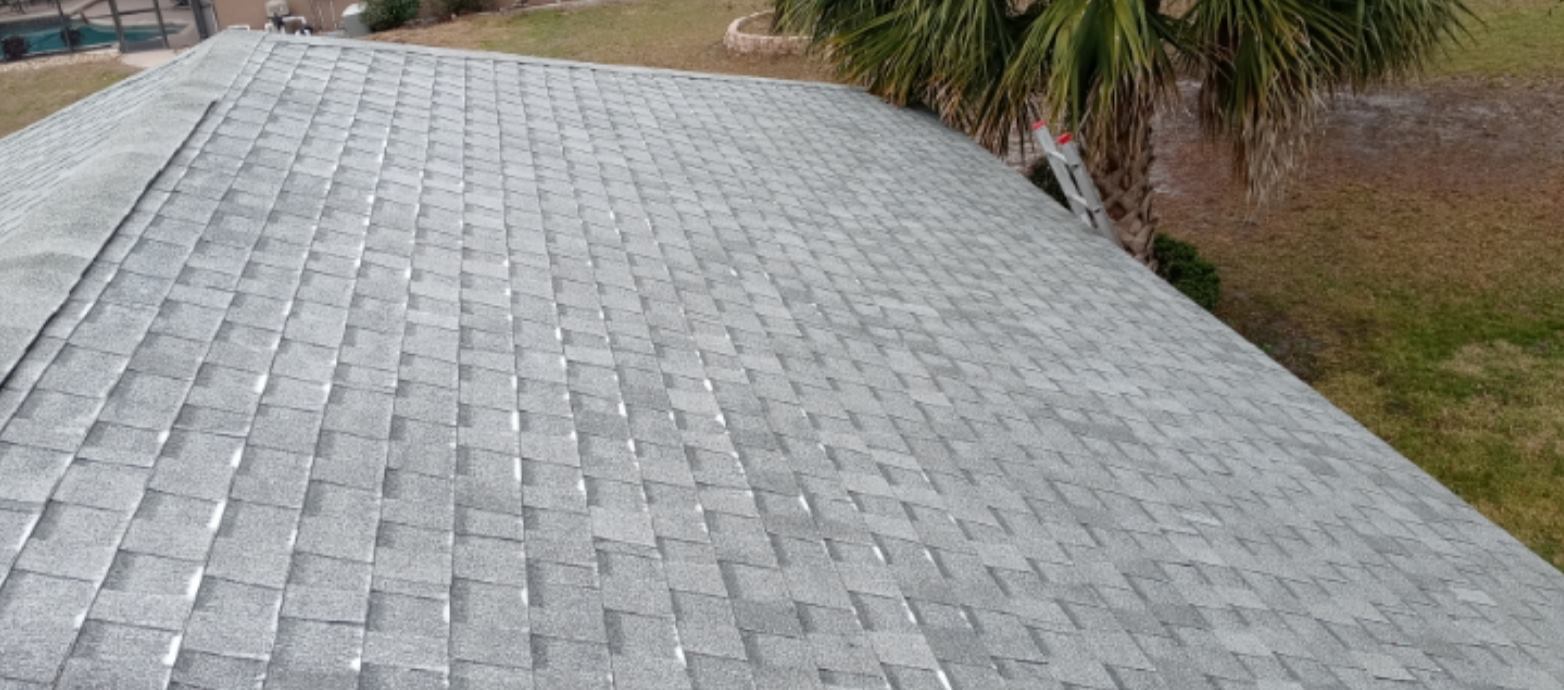 The same style of shingle roof, clean and bright after restoration
