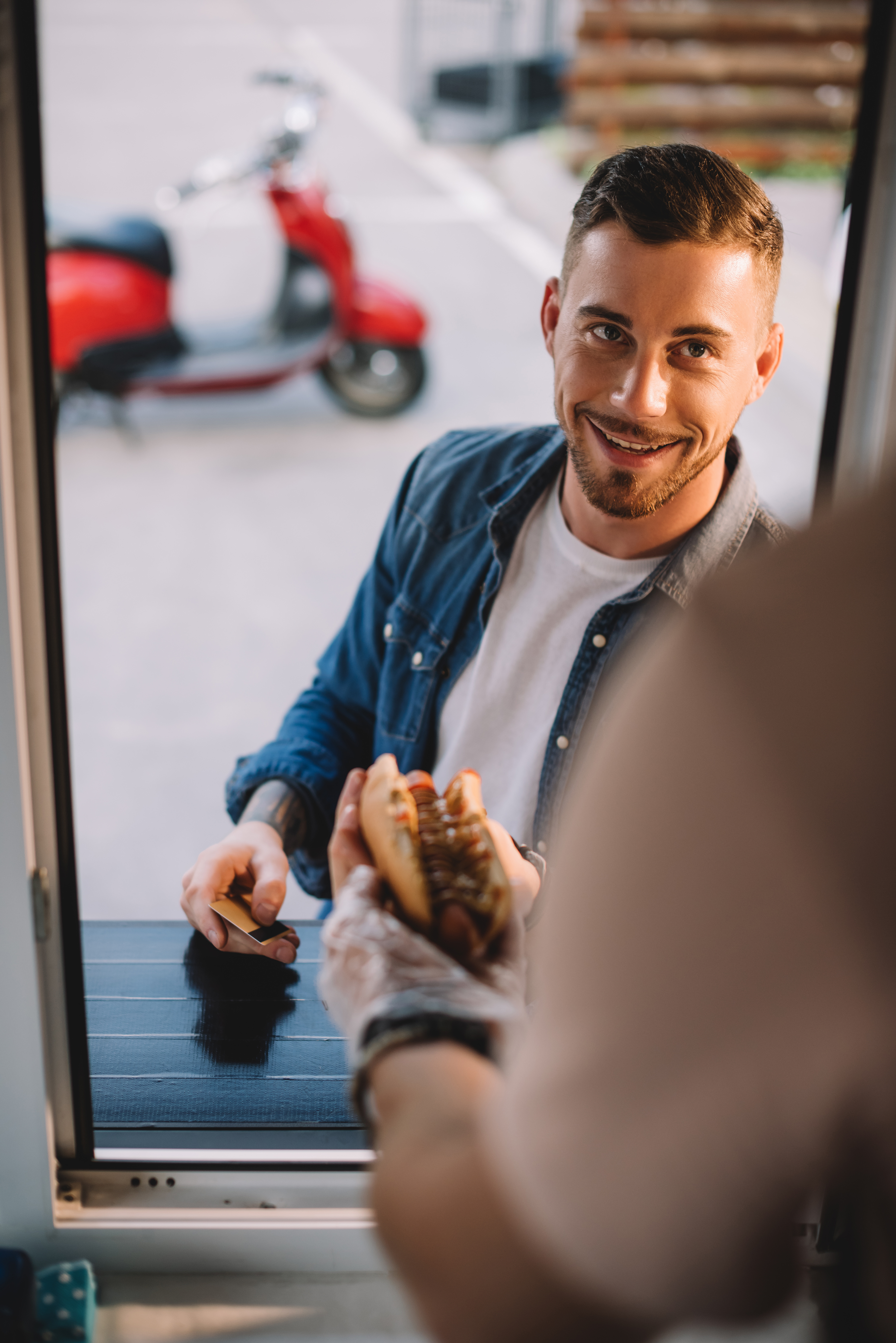 Customers at the Taco Santo window