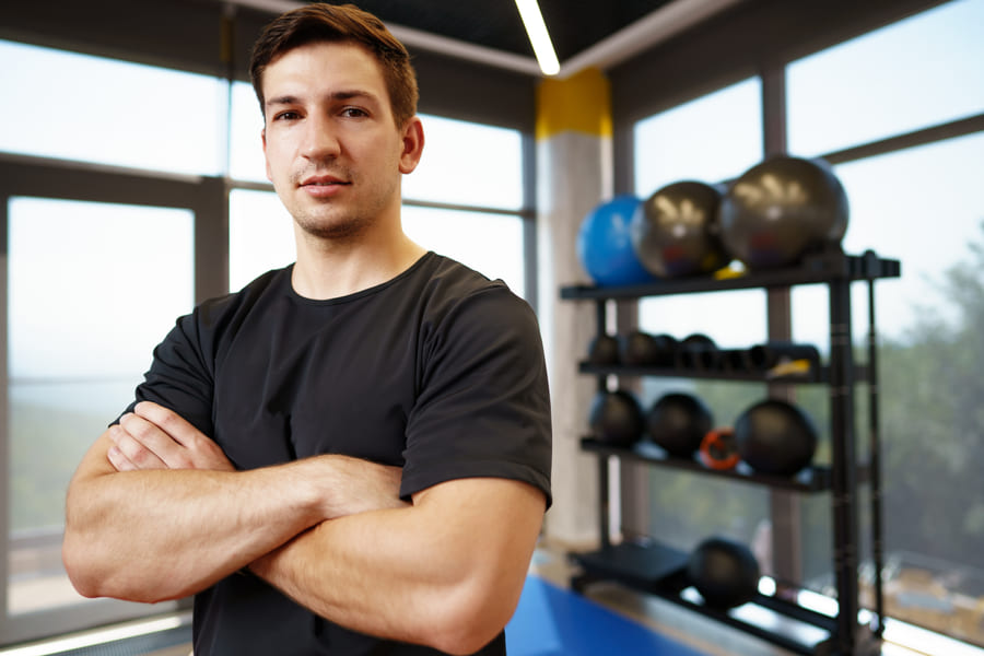 John Doe, strength coach at Forge Athletic Club